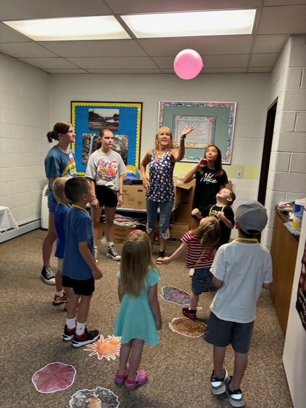 Group Of People Standing In Circle